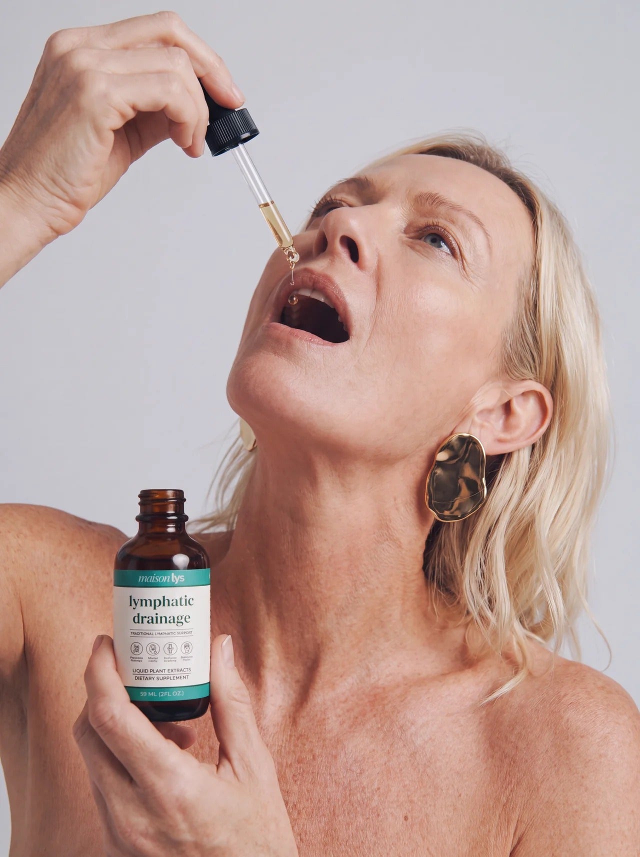 Taking Maison Lys drops